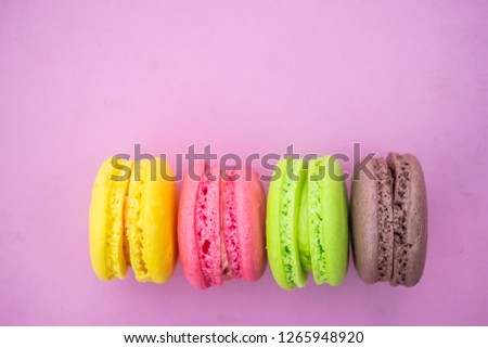 Similar – macarons lies in a row in the middle