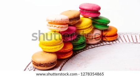 Similar – Image, Stock Photo Colored macaroons on rustic wooden background