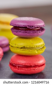 macaroons on a dark table