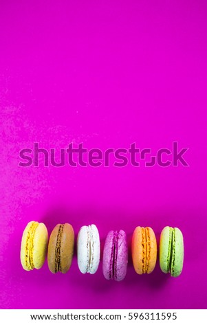 Similar – Image, Stock Photo row of multicolored cakes