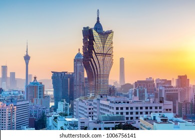 Macau, City Skyline At Sunset.