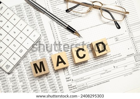 MACD, Moving Average Convergence Divergence on wooden blocks