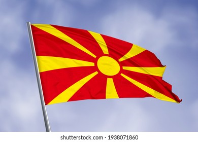 Macedonia flag isolated on sky background. close up waving flag of Macedonia. flag symbols of Macedonia.