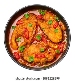 Macher Jhol In Black Bowl Isolated On White. Indian Cuisine Bengali Fish Curry. Asian Food And Meal. Top View