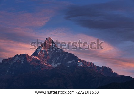 Machhapuchchhre mountain at sunset - Fish Tail in English is a mountain in the Annapurna Himalya, Nepal