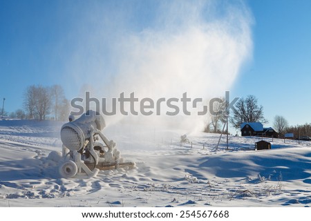 Machine for artificial snow at a ski resort