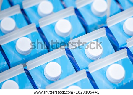 Machine for bottling milk, industry equipment dairy plant.
