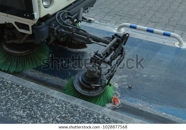 Machine for\
cleaning streets during work\
outdoor