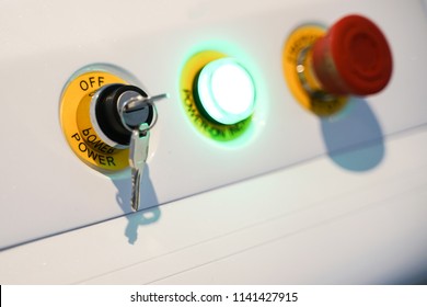 Machine control panel for start stop working and the red emergency button  - Powered by Shutterstock