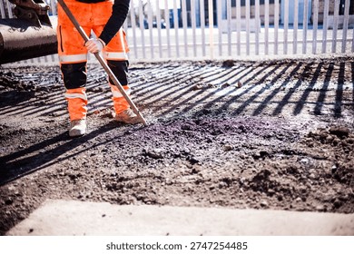 machine digging, mining, grading construction workers wearing hi vis people at work 