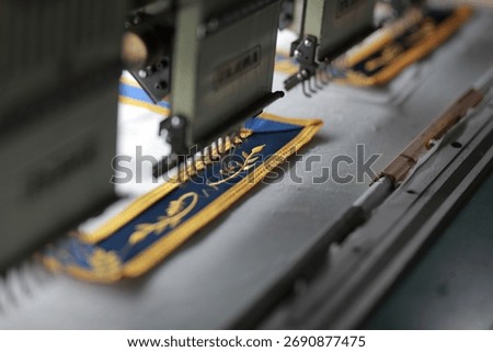 Machine embroidery is the process of using a sewing or embroidery machine to create decorative stitching on fabric.