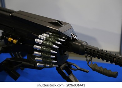 machine gun with a belt of cartridges