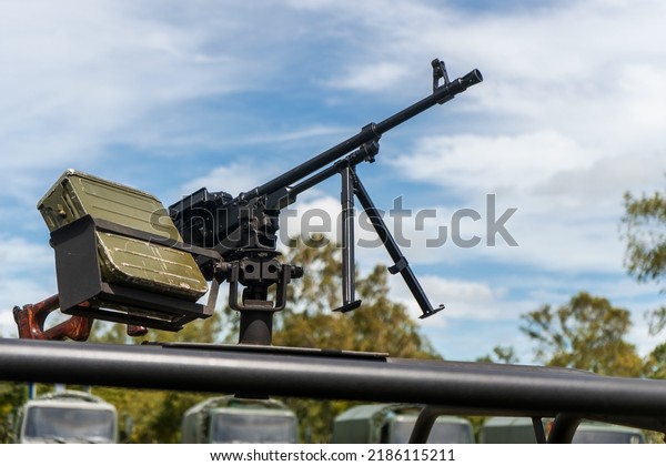 Machine gun mounted on a\
combat vehicle