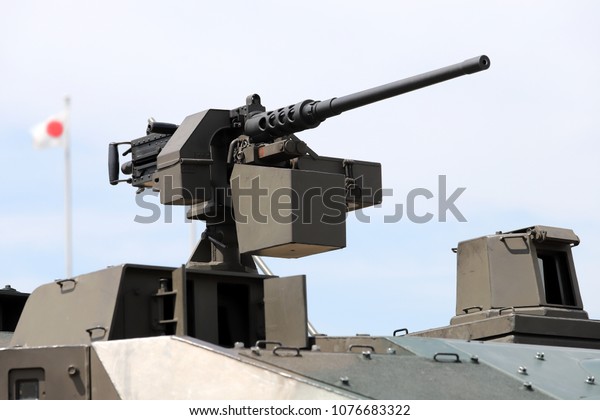Machine gun\
mounted on a Japanese military\
vehicle