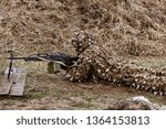 Machine gunner in combat position