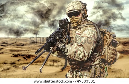 Machine gunner in the desert in action