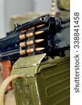 machine guns and boxes of ammunition 
