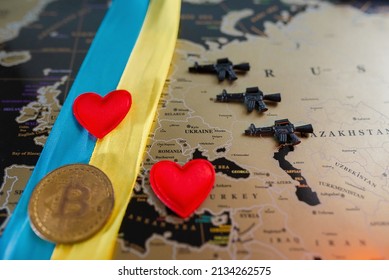 Machine guns on the background of a map of Europe and hearts with the Ukrainian ensign