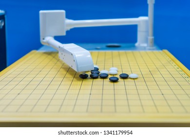 Machine learning concept with artificial Intelligence robot play go