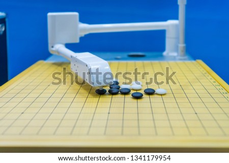 Machine learning concept with artificial Intelligence robot play go