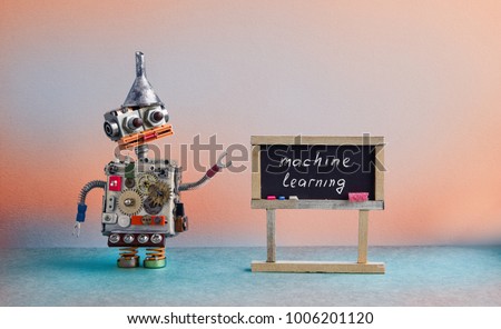 Machine learning concept. Robot creative design toy metal funnel hopper, cogs wheels gears metallic body. Black chalkboard classroom interior, futuristic colors background.