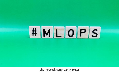 Machine learning Operations - MLOps word with hashtag on green background for posts