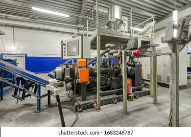 A Machine For Mixing Rubber Components. Interior Of A Factory For Manufacturing Rubber Conveyor Belts.