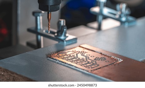 machine with numerical control CNC carries out milling of printed circuit boards, Circuit Engraving, Diy Circuit Boards PCB - Powered by Shutterstock