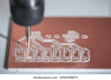 machine with numerical control CNC carries out milling of printed circuit boards, Circuit Engraving, Diy Circuit Boards PCB - Powered by Shutterstock