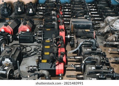 Machine part industrial engine assembly repair workshop metal equipment mechanical parts arranged workshop for engine repair, showing industrial metal equipment, assembly component, pipe, gear