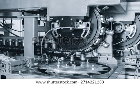 Machine for producing plastic beverage bottles using extrusion method from plastic preformed PET capsules