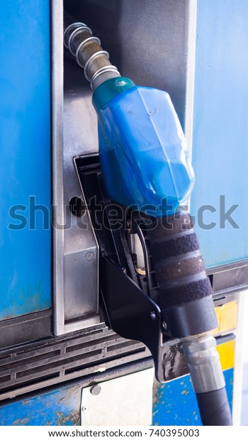 A machine for putting gas or petrol into car ,\
oil pump , Gas station