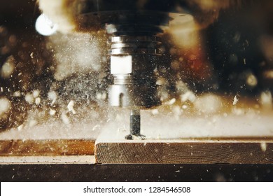 Machine tool in wood factory with drilling cnc machines. Computer numerical control.
