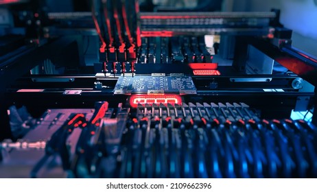 Machine Vision System Inspect PCB For Components Size And Placement. Technology Electronics On SMT Line For Production Of Computer Chips By SMT Pick And Place Machine With Machine Vision System.