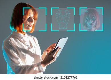 Machine vision technology concept. Face recognition using app. Human face recognition technology. Girl with tablet is being identified. Woman scans her face with camera gadget.