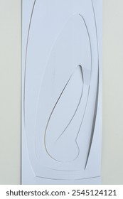 machine-cut paper with sharp curves on blank paper