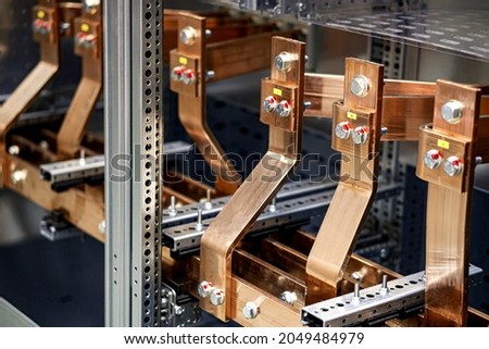 machined copper busbars in electrical power distribution cabinet for motor control centers