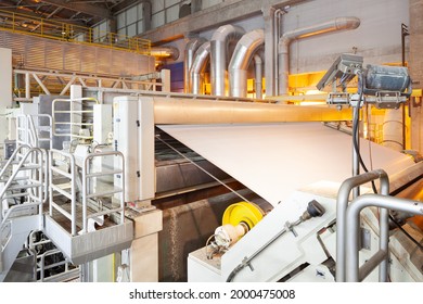 The machinery in a paper mill plant. - Shutterstock ID 2000475008