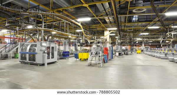 machines of a large printing plant - printing\
of daily newspapers