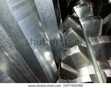 Machining process of involute gear cutting-closeup of gear cutting tool hob and gear teeth