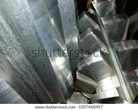 Machining process of involute gear cutting-closeup of gear cutting tool hob and gear teeth