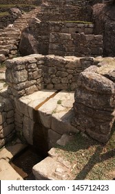 Machu Picchu Fountains Running Down By The Stone Stairs. Cuzco, Peru.