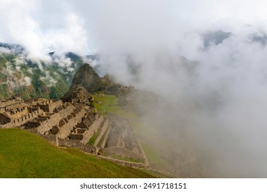 Machu Picchu inca ruin in the autumn mist, Machu Picchu Historical Sanctuary, Cusco, Peru. - Powered by Shutterstock