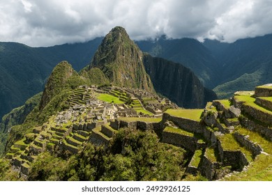 Machu Picchu Inca ruin in clouds, Machu Picchu historical sanctuary, Cusco, Peru. - Powered by Shutterstock