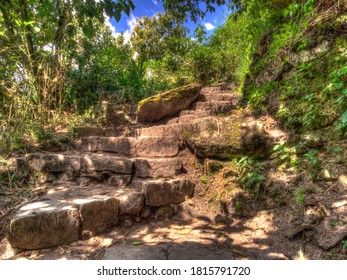 Machu Picchu, Peru - May 2016: Trail Along The Winding Stairs To The Machu Picchu Ruins. Latin America.