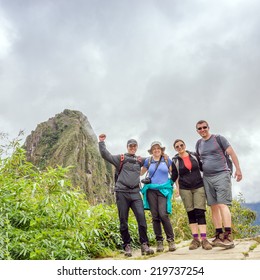 MACHU PICCHU, PERU - MAY 3, 2014 - Group Of Tourists After Climbing Huayna Picchu Mountain