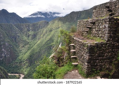 Machu Picchu Ruins With Steep Stairs Climbing, Peru