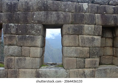 Machupicchu  Cusco  Peru Historical, touristic place of the ancient civilization of the Inca Empire. Runes of the ancient city on the mountain of Machupichu and Huayna Picchu. House with window 