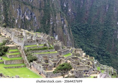 Machupicchu  Cusco  Peru .Historical, touristic place of the ancient civilization of the Inca Empire. Runes of the ancient city on the mountain of Machupichu and Huayna Picchu. Part of the city 