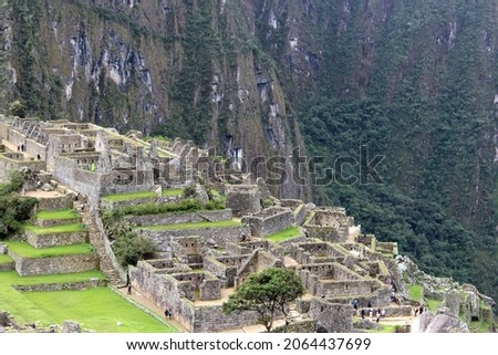 Machupicchu  Cusco  Peru .Historical, touristic place of the ancient civilization of the Inca Empire. Runes of the ancient city on the mountain of Machupichu and Huayna Picchu. Part of the city 